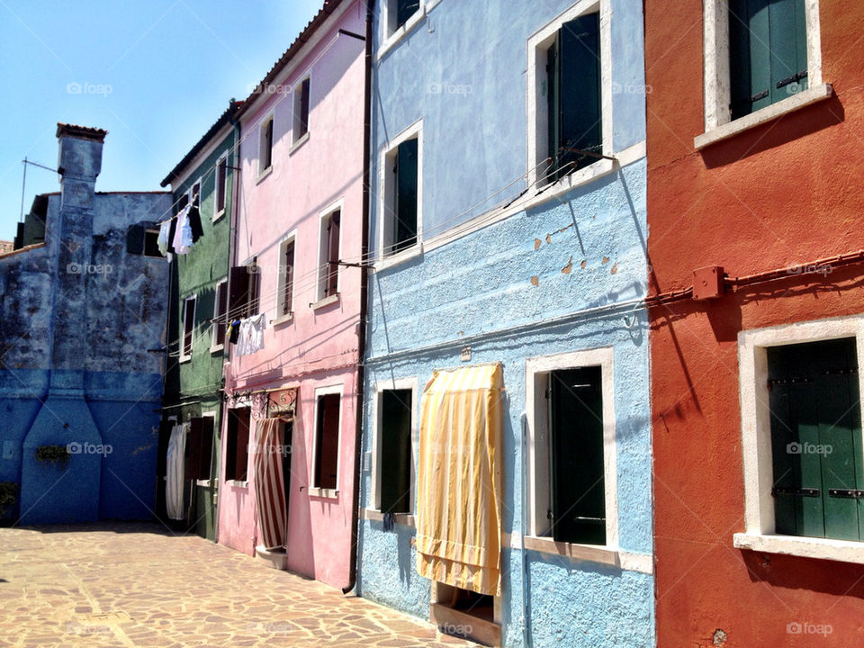 colourful houses in venice by dannytwotaps