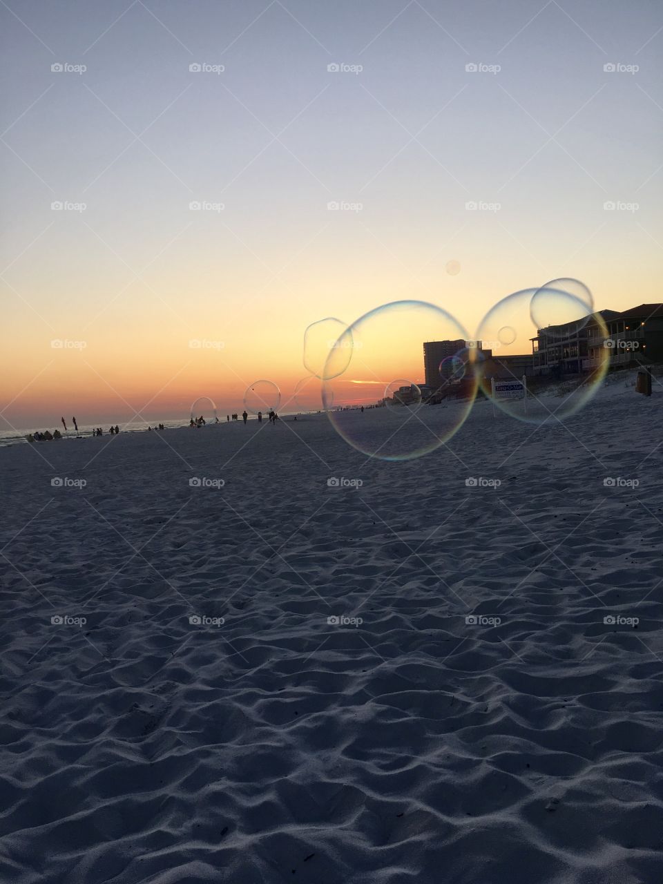 Bubbles floating into the sunset 