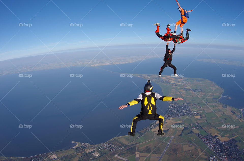 Skydiver over the beach