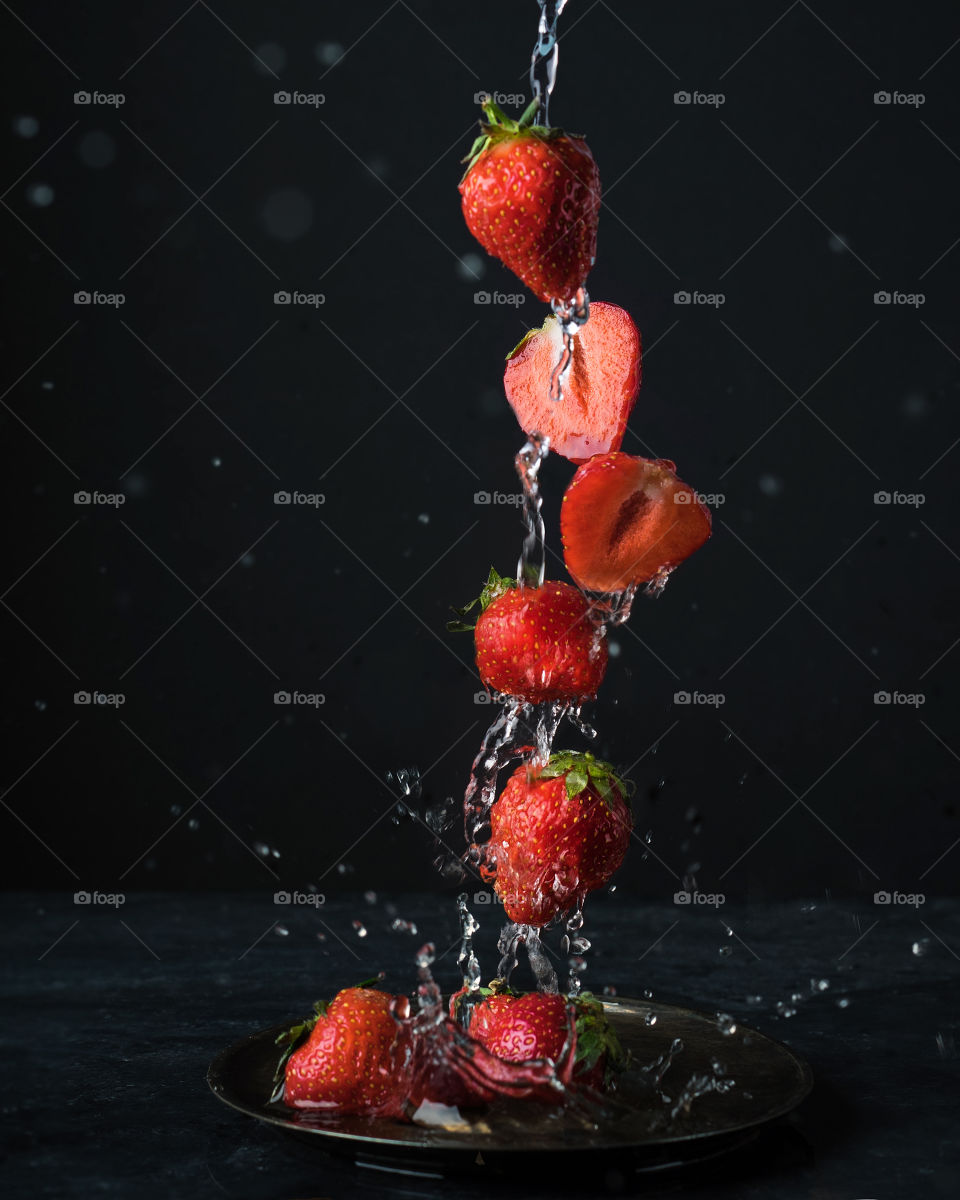 Fresh strawberries in water