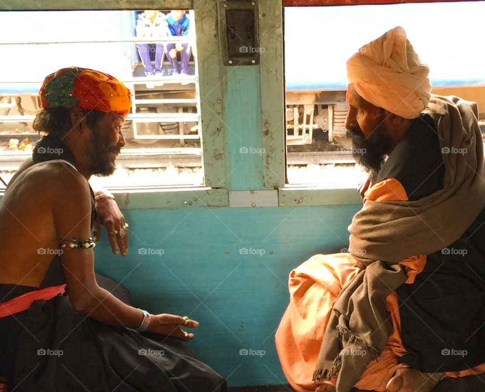 Religious Indian train passengers.