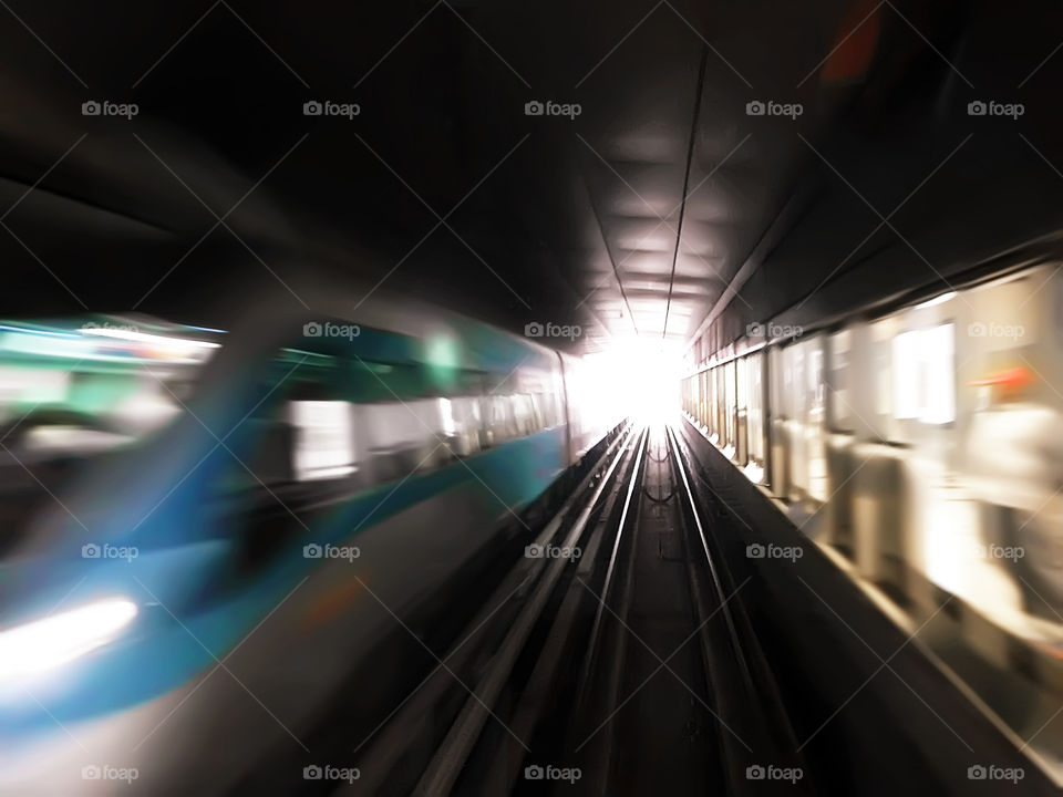 Trains moving through the city subway tunnels 