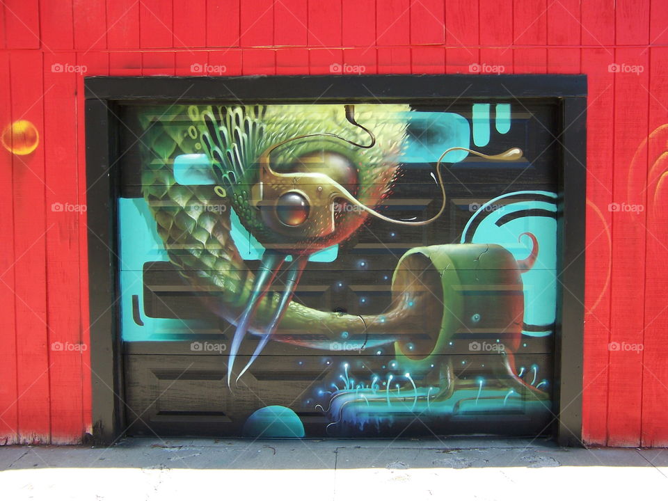 Alien. Driving through the alley