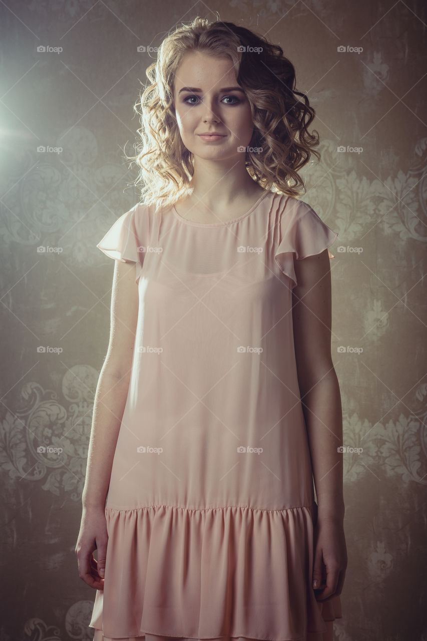 Beautiful young woman romantic studio portrait 