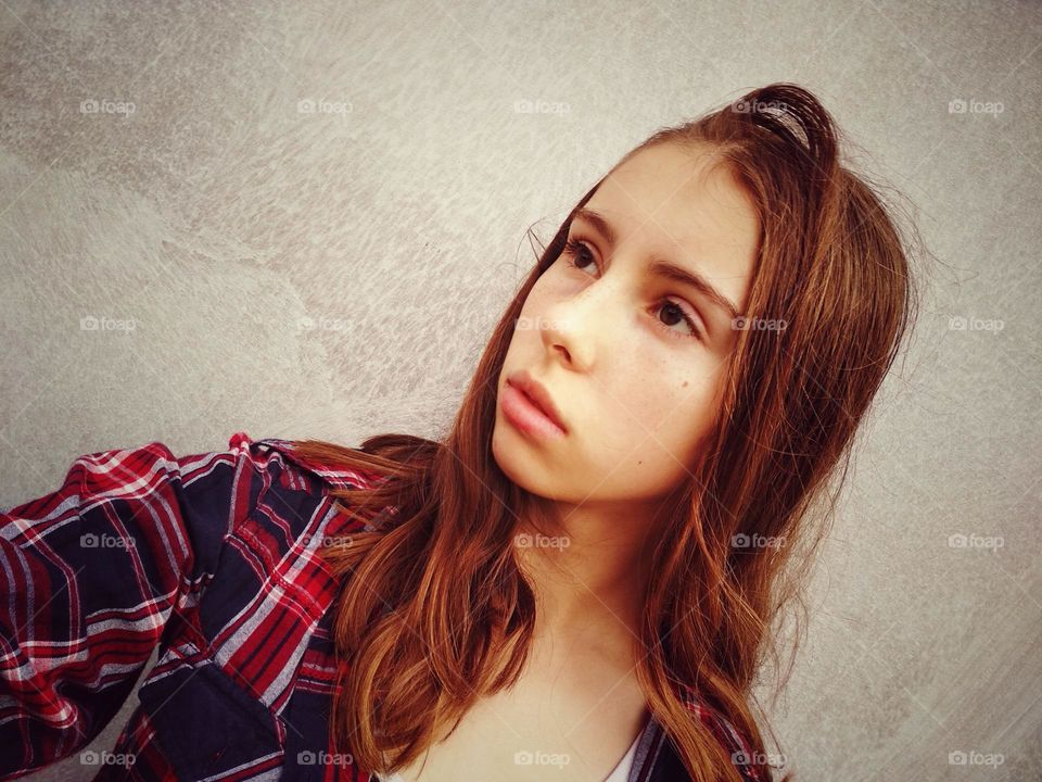 Girl in flannel shirt. Portrait