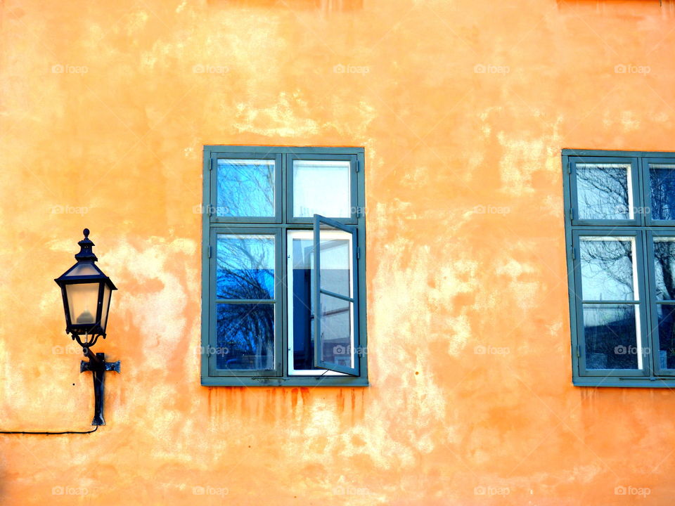 Colorful wall in the old town of Stockholm, Sweden on a sunny spring day.