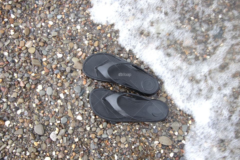 Totes sandals at beach