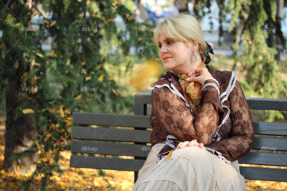 Portrait of a lady in the autumn