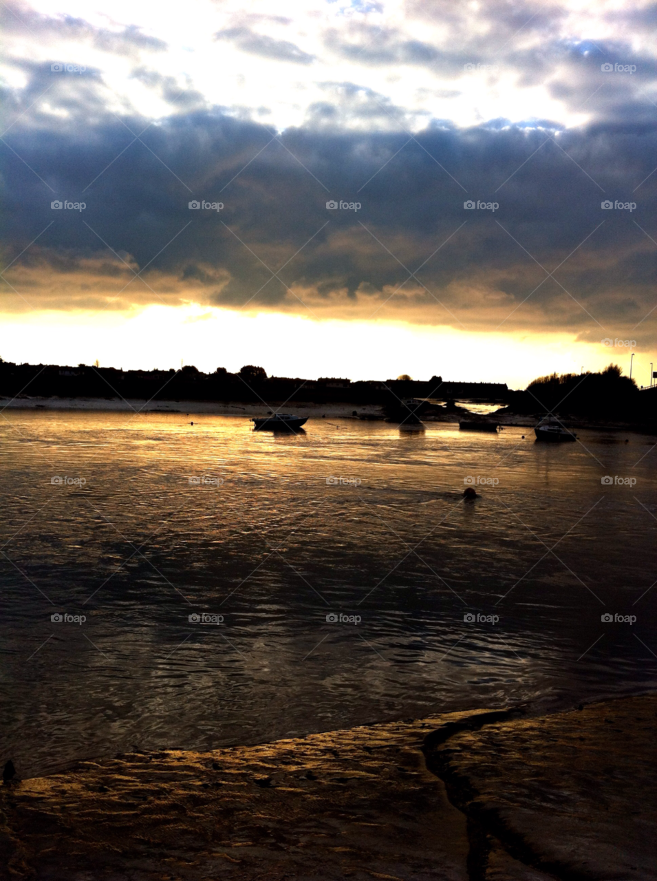 sunset clouds boats water by SmileItsJo