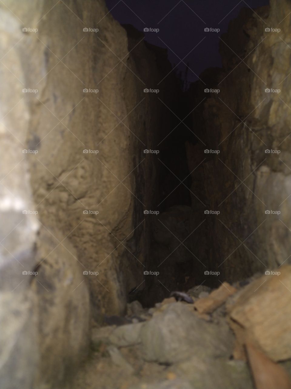 When you are alone between large rock in late evening.