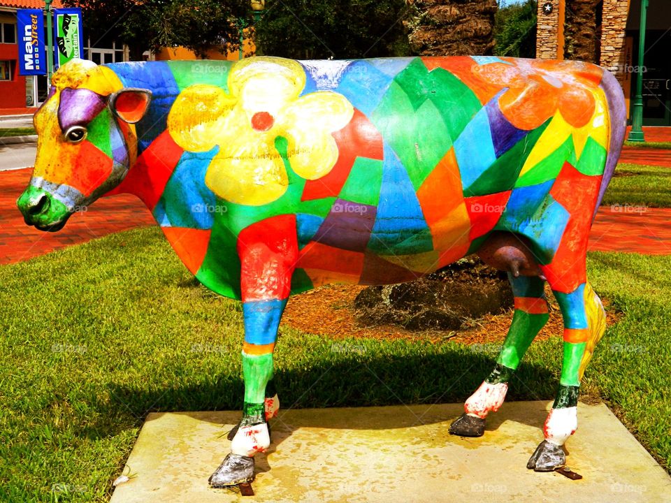 Colorful cow - Visual Art that can be found on the street. Visual Street art is essentially synonymous with public art as it encompasses a variety of mediums like painting, sculpture, and stained glass