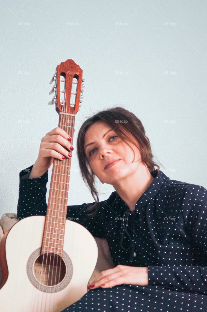 Beautiful girl and gitar