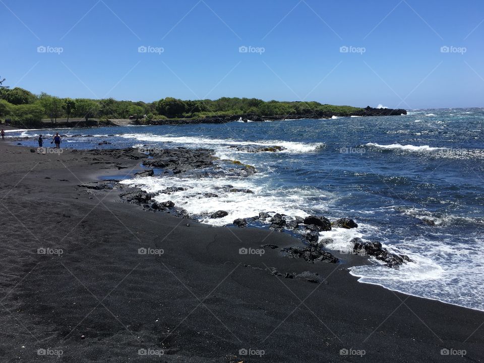 Black sand beach in Hawaii big island.