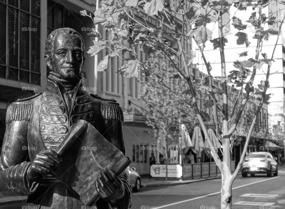 Captain James Stirling statue stands on the avenue near the City of Perth Library. Monochrome Image.