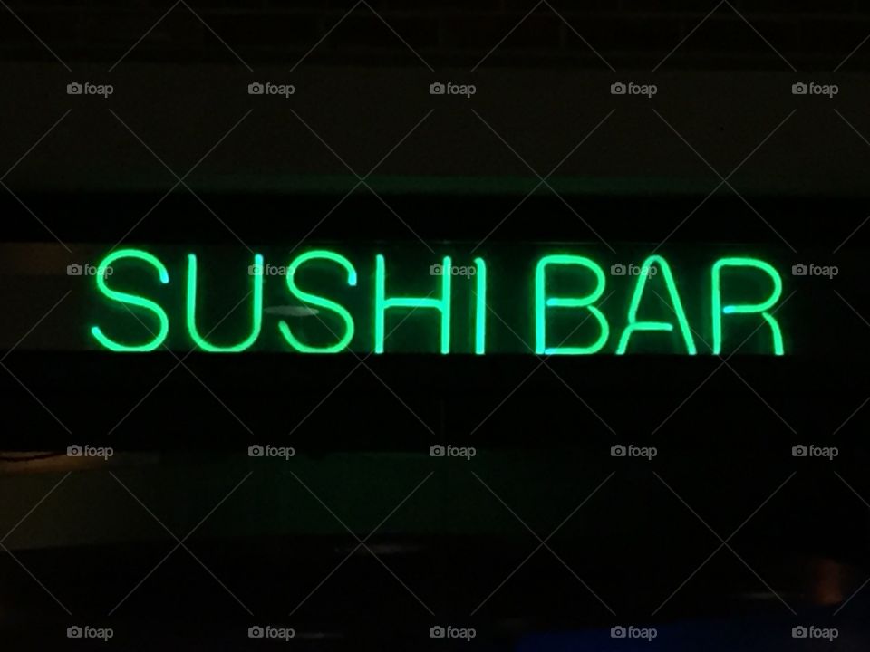 Neon sushi bar sign