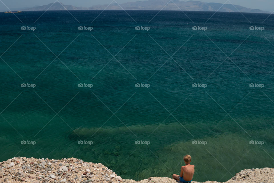 Seascape and tiny man