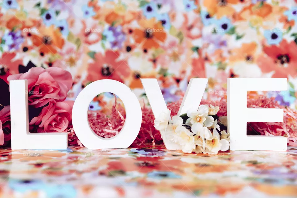 love letters over flowers