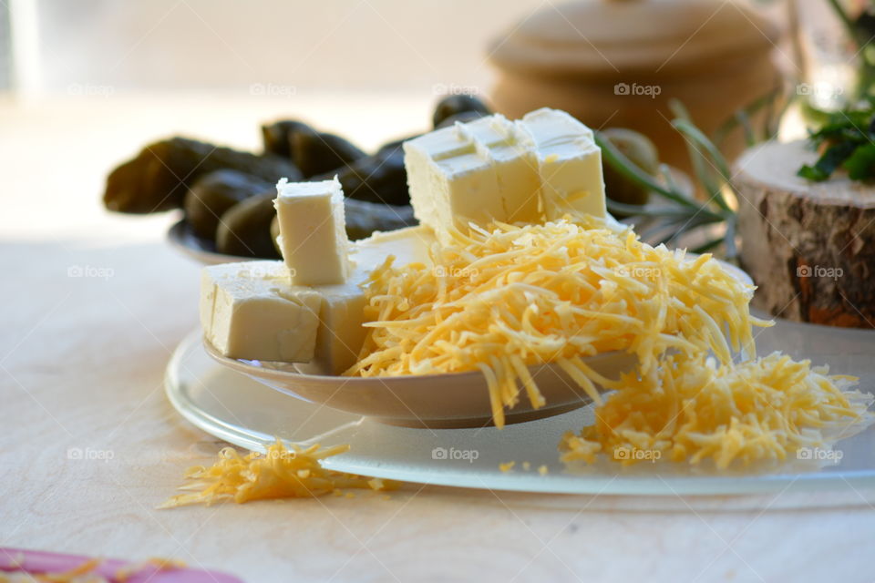 Grated cheese on plate