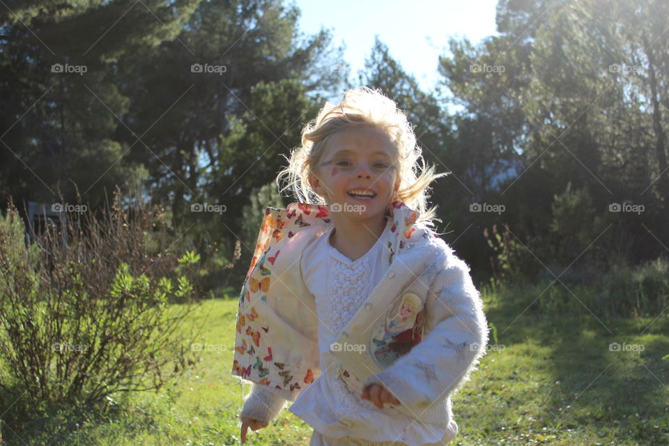 Girl running in nature