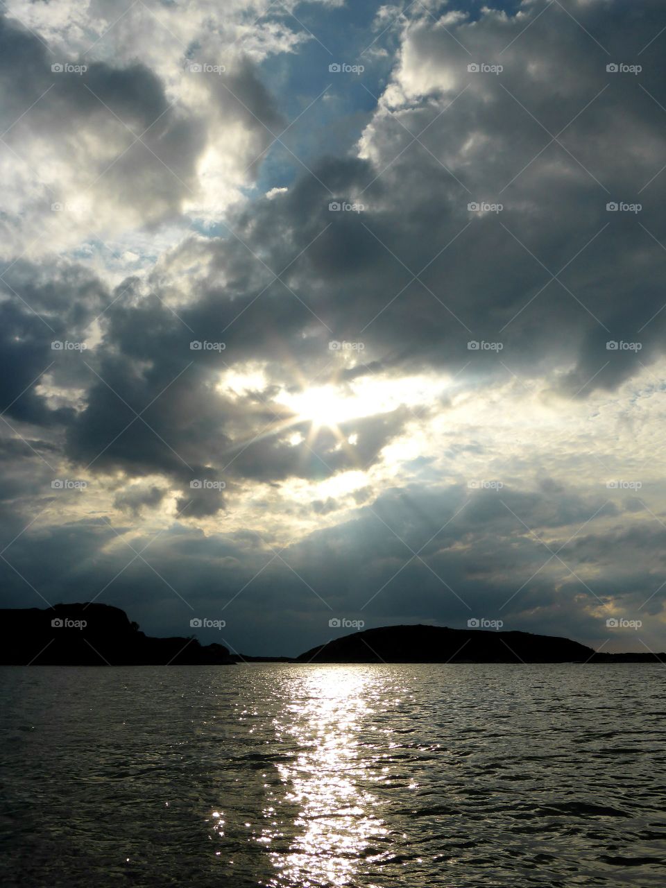 sunrays through the clouds