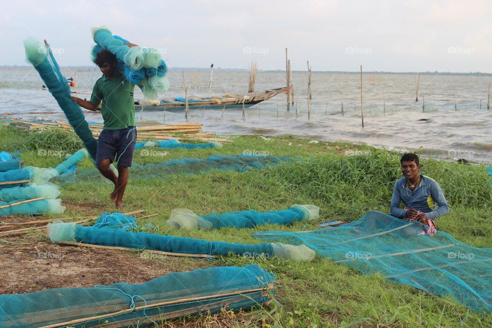 This picture was from the chilika lake side, Odisha, India.
this picture describes the real beauty of nature and the people of the small island they live between the lake, mostly fishermen are staying there.
