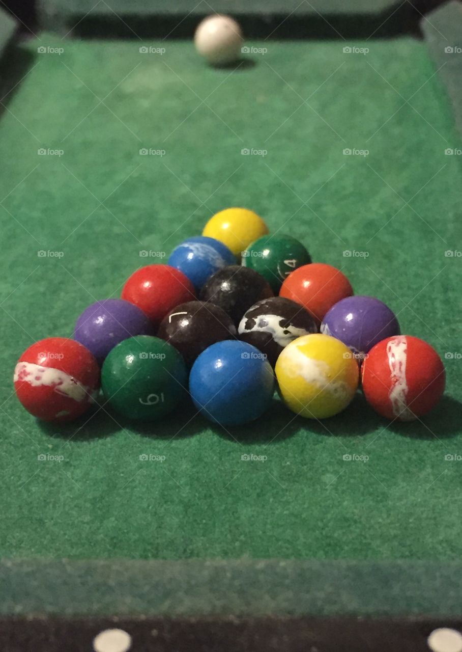 Mini pool table - balls are racked