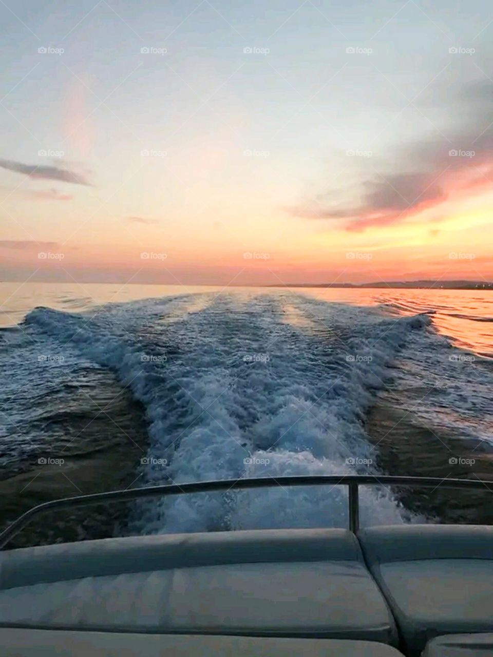 With sunset time, the view of the waves.
