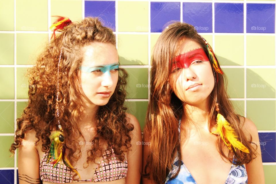Two young woman with face paint