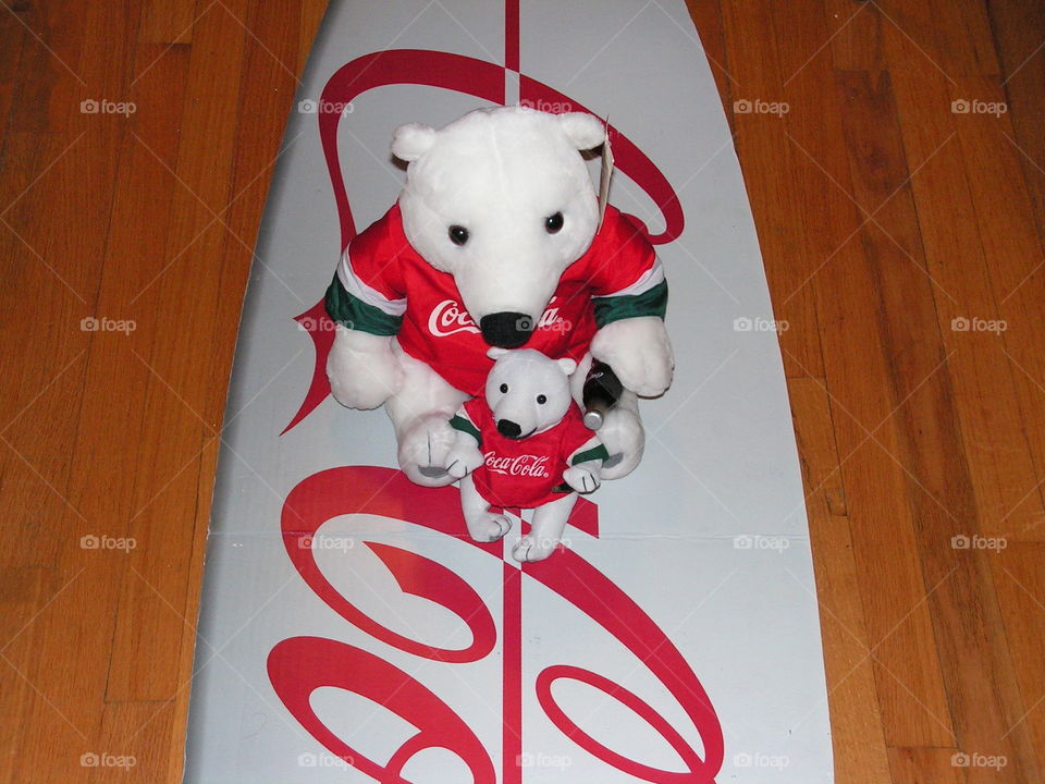 Polar bears on Coke surfboard