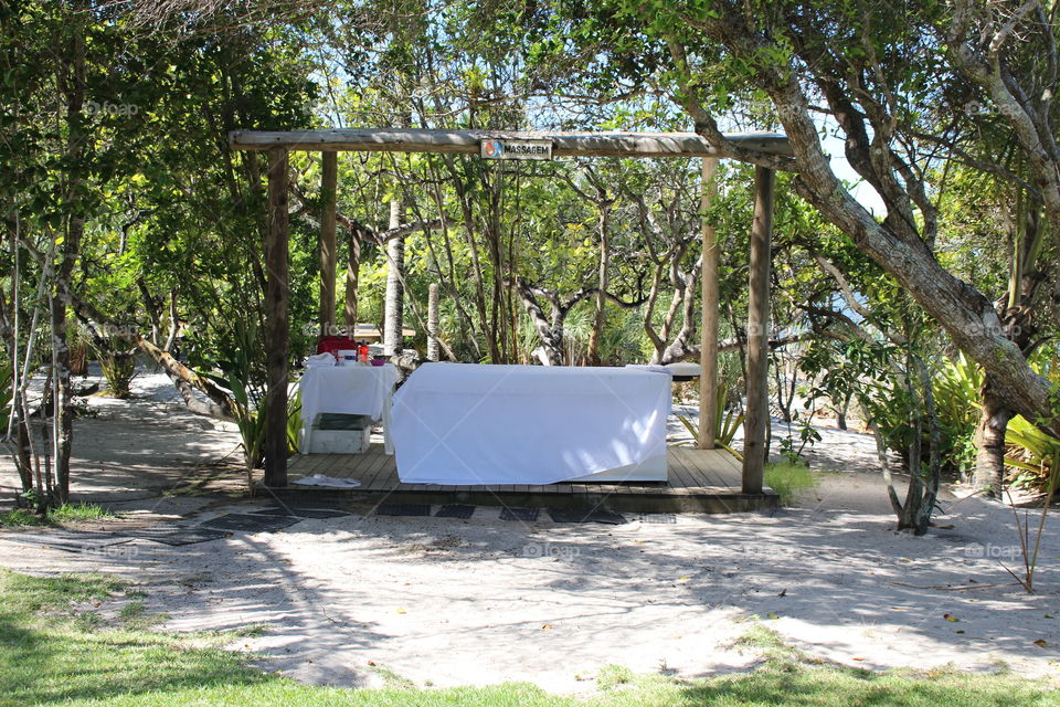 inviting massage bed on the beach