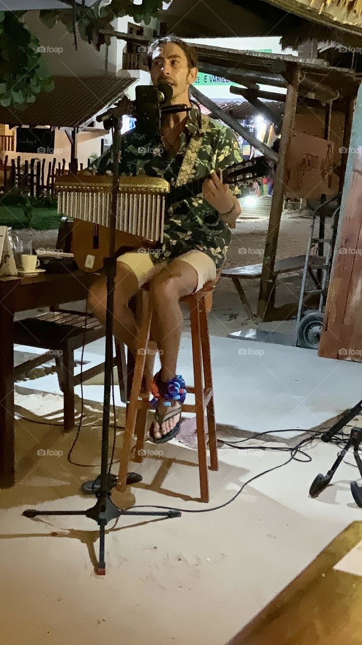 Playing instrument and singing 