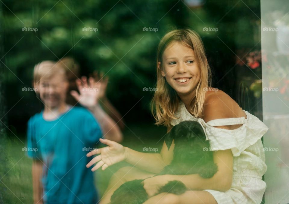 children near the window