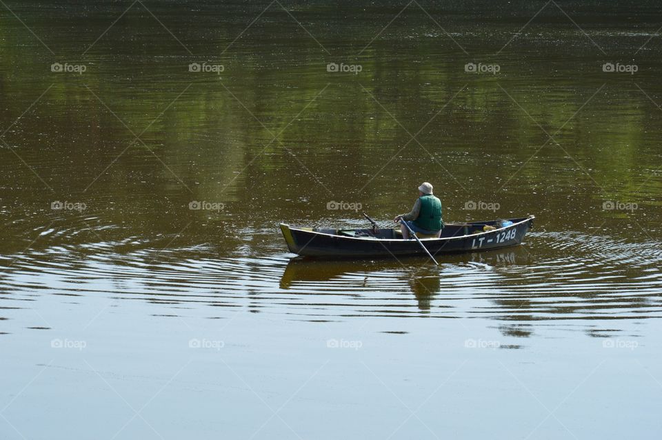 boat and fishermen