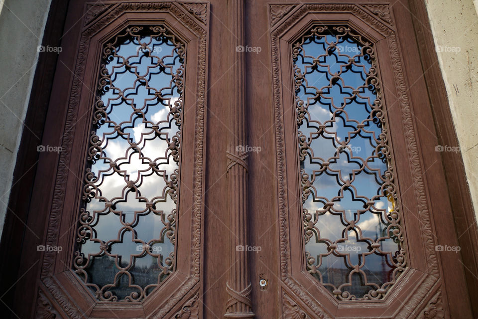 Beautifully organized patterns of a door in Budapest, Hungary.