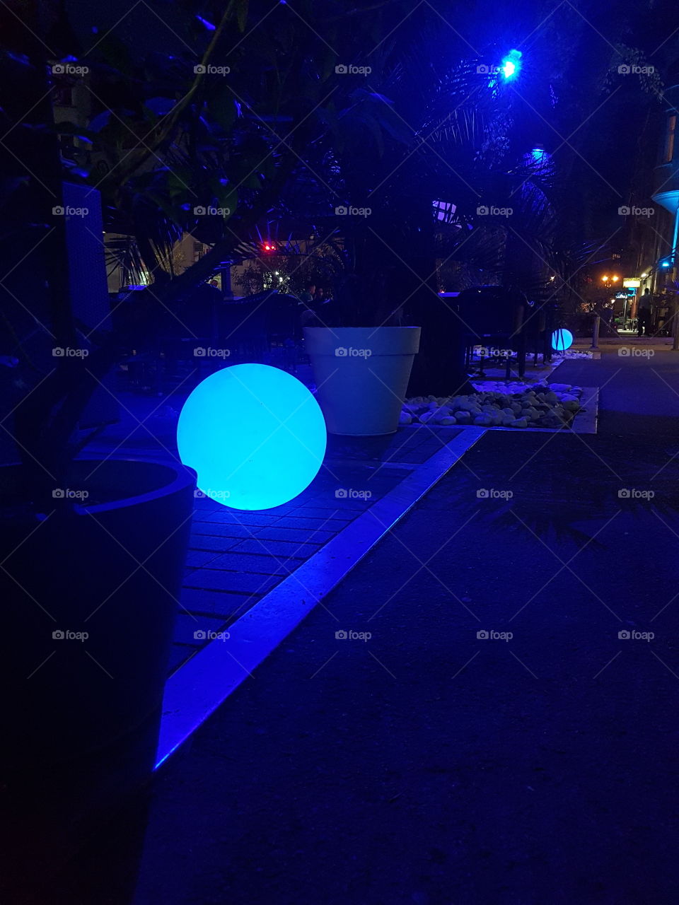 blue ball in the park at night