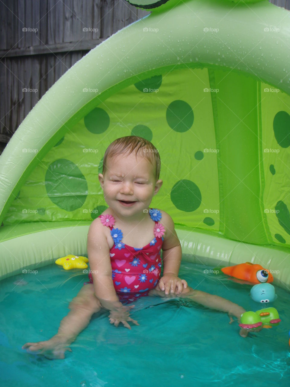 Baby's first time in a pool!