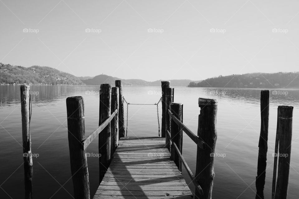A wooden jetty on the small lake of Orta