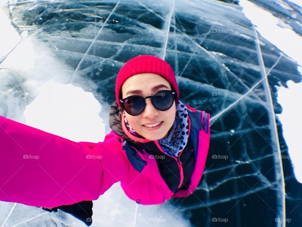 Selfie myself at Baikal Lake in February. Love contrast pink and blue. Smile under minus 22 c degree is crazy, I know.