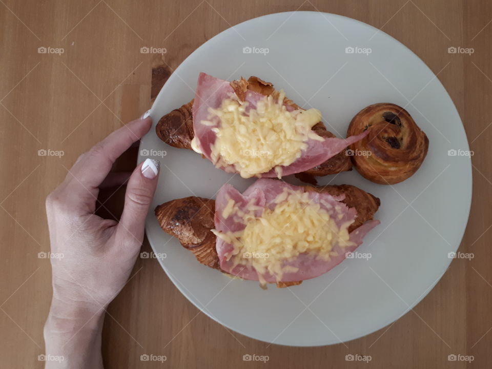 Hot croissants with ham and cheese