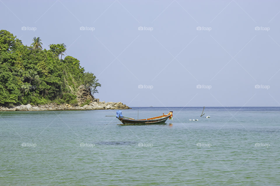 Fishing boats parked on the Beach at Haad salad , koh Phangan, Surat Thani in Thailand.