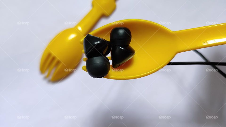 headphones in a fork