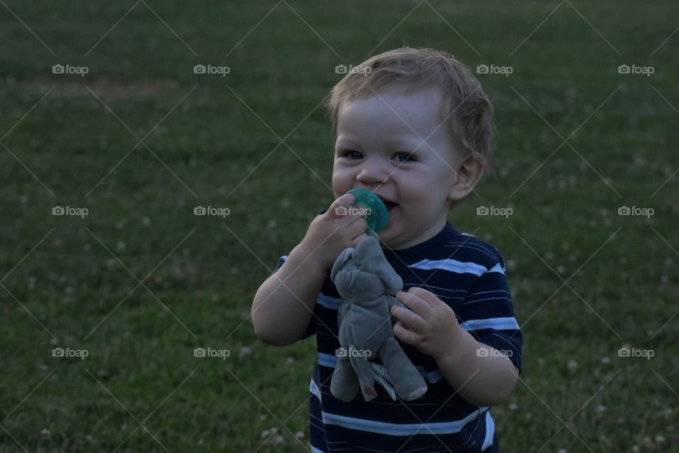 Cute happy toddler boy candid 