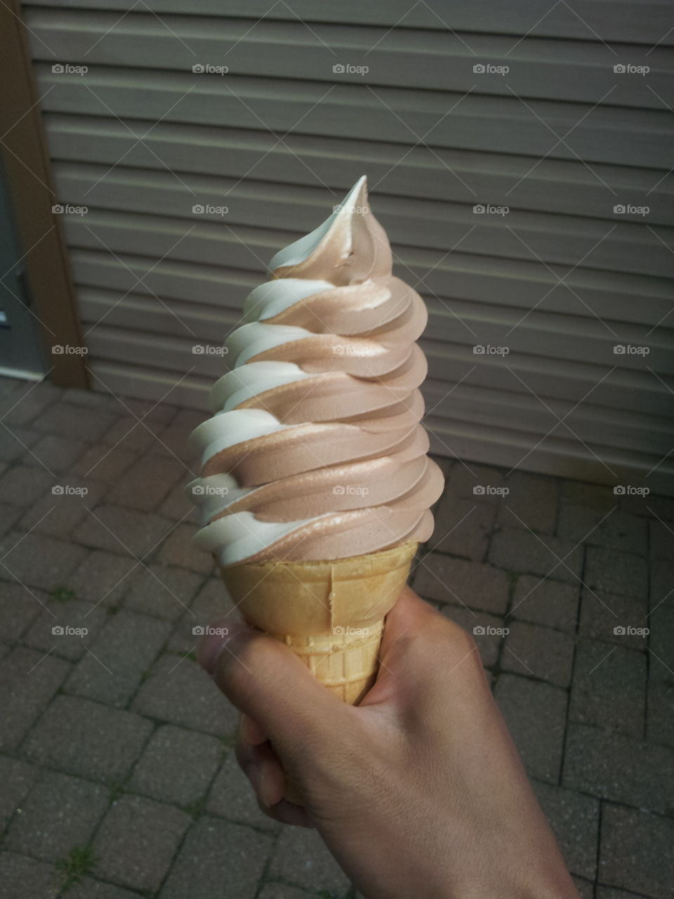 Chocolate vanilla ice cream twist cone 