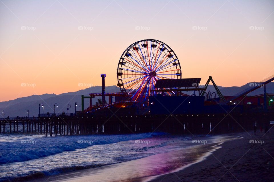 Ferris wheel at Santa Monica pier during sunset