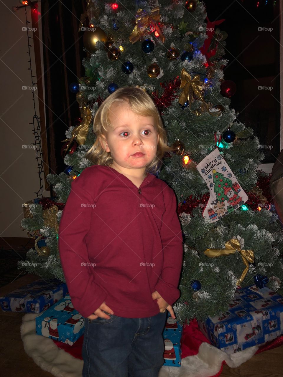 little boy can't wait for Christmas to come