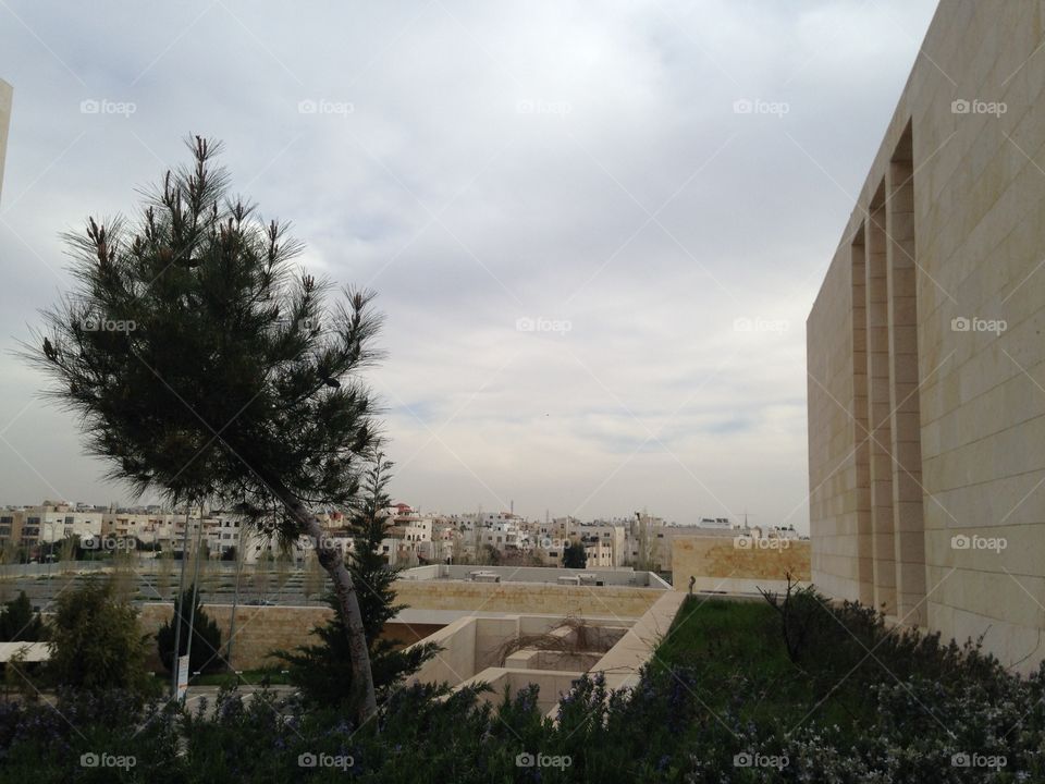 Building over cloudy sky