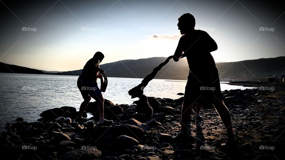 Brother and husband play around in the sunset!