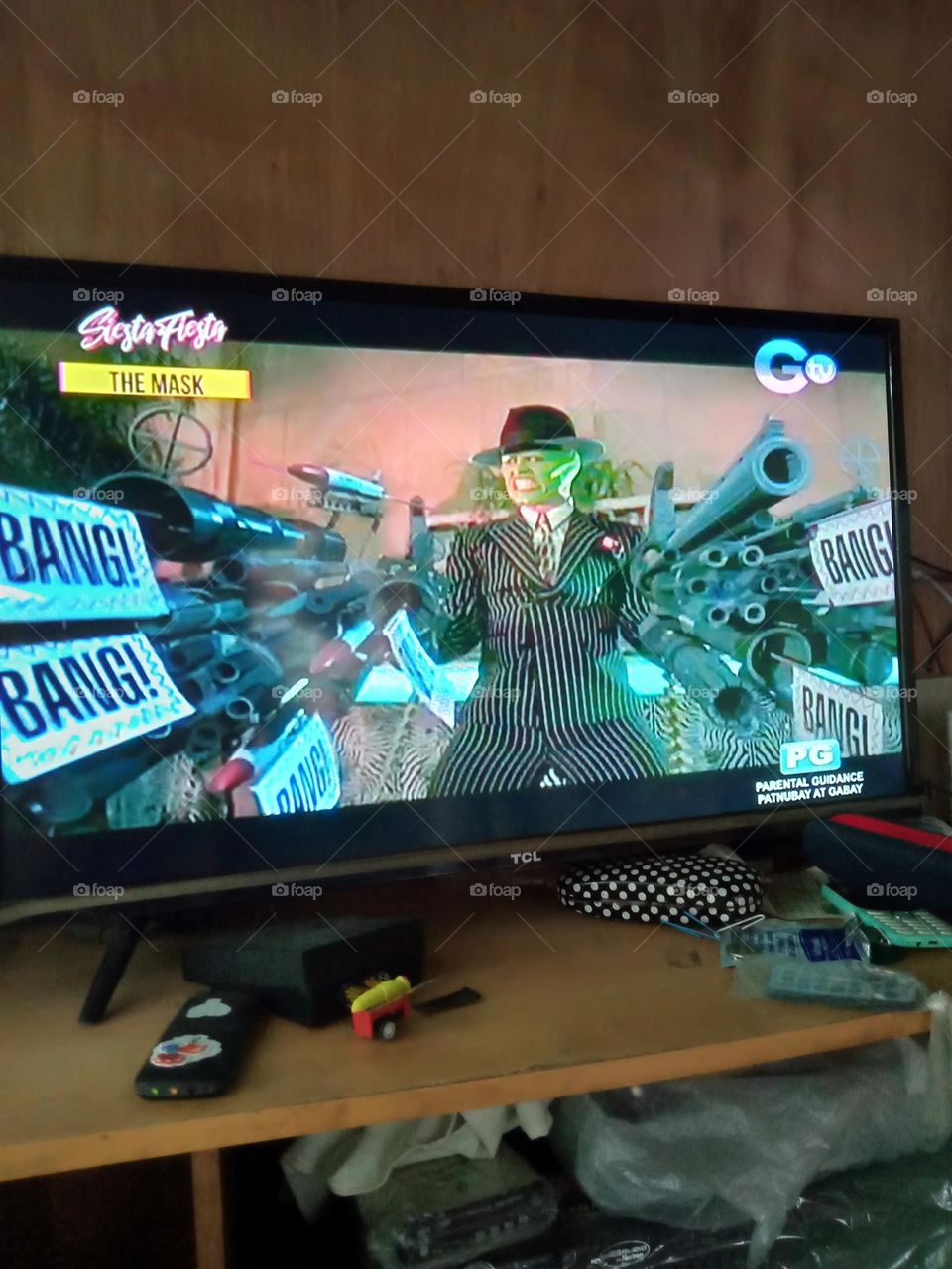 THE MASK MAN IS DISPLAYING HIS FIREARM READY TO FIRE AS BANG BANG BANG BANG