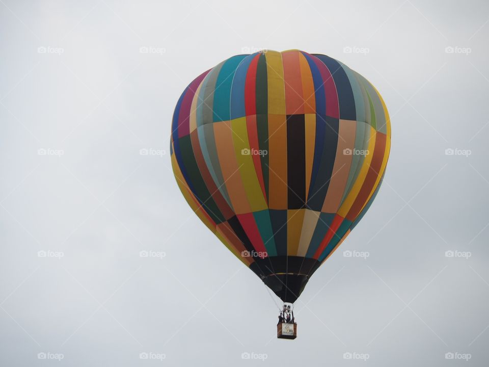 colorful baloon on cloudy sky