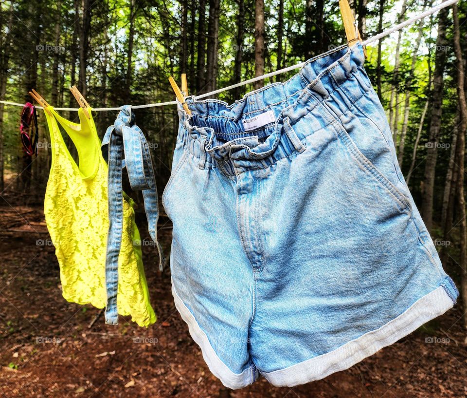 Summer outfit hanging on the clothes line